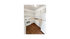 Bright and inviting kitchen with modern white cabinets, sleek appliances, and elegant wood flooring.