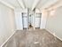 Inviting bedroom with plush carpet flooring, featuring two spacious closets and modern ceiling accents for a cozy living space.