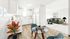 Chic virtually staged apartment featuring a cozy kitchen with modern appliances, stylish dining area, and inviting living room with elegant decor.