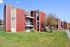 Sunridge Apartment Homes exterior with lawn in Englewood, CO