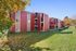 Sunridge Apartment Homes exterior with trees in Englewood, CO