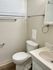 Elegant bathroom with modern fixtures, neutral tones, and ample natural light.
