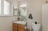 Bright, contemporary bathroom with sleek vanity and modern fixtures.