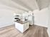Modern kitchen with sleek countertops, stylish cabinetry, and spacious layout featuring an elegant island centerpiece.