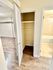 Inviting apartment with sleek hardwood floors, ample closet space, and a modern tiled bathroom.