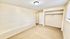 Bright, spacious bedroom with a built-in closet, ready for customization and plenty of natural light.