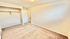 Bright and airy bedroom with plush carpeting, ample closet space, and soft, neutral walls.
