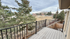 Charming balcony with scenic views of lush greenery, perfect for relaxing outdoors.
