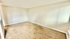 Bright and spacious living area with plush carpet and neutral walls, offering a cozy and welcoming atmosphere.