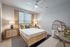 Furnished bedroom with bed and tables