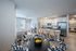 Furnished kitchen with large island and dining room table