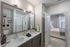 Furnished bathroom with double vanity