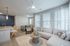 Furnished living room with couch and coffee table
