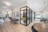 Furnished clubroom with shuffleboard table and conference room