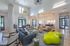 indoor community ckub house with many seating options and open concept