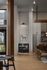 Chic open living space featuring a cozy dining nook, stylish kitchen, and natural light.