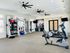 Bright and modern fitness center with state-of-the-art equipment and exercise facilities.