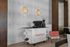 Elegant coffee station with modern lighting and Trapeze branding.