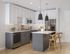 Modern kitchen design with sleek cabinetry, stainless steel appliances, and elegant pendant lighting over a stylish island with wooden bar stools.