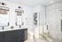 Luxurious and modern bathroom featuring dual vanity sinks, elegant mirrors, a spacious glass-enclosed shower, and chic shelving for a spa-like experience.