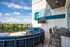 Chic urban terrace at Eastside Heights with stylish seating, city views, and outdoor entertainment.