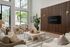 Elegant living room with high ceilings, showcasing modern wooden wall paneling, large windows with lush garden views, and stylish seating for a luxurious ambiance.
