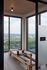 Luxurious apartment flex studio with modern Pilates equipment and stunning panoramic city views.