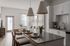 Bright, modern kitchen and living area with elegant granite countertops, cozy seating, and stylish pendant lighting.