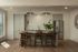 Modern kitchen with sleek cabinetry, stylish bar stools, and stainless steel appliances, exuding elegance and functionality.