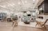 Luxurious and spacious living area with elegant decor, featuring a modern fireplace, stylish seating, and exquisite lighting.