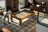 Bright and inviting game room featuring a stylish pool table, cozy seating area, and elegant brick walls, perfect for relaxation and entertainment.