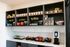 Contemporary snack wall in an apartment with a variety of chips, ramen, and snacks, creating a cozy and convenient living space.