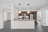 Sleek modern kitchen with granite countertops, stainless steel appliances, and stylish pendant lighting, opening into a spacious, light-filled living area.