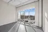 Bright and modern apartment corner with expansive windows offering stunning views and abundant natural light.