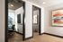 Bright, modern office space with sleek, contemporary artwork and abundant natural light.