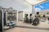 furnished fitness area with equipment