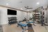 furnished fitness area with equipment