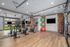 furnished fitness area with equipment