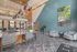 furnished leasing office area with seating and tables