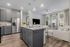 furnished kitchen with island in apartment home