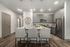 furnished kitchen with island in apartment home