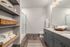 furnished bathroom with standing shower and sink in apartment home