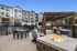 Fire pit with pool and exterior in the background