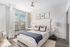 Furnished bedroom with curtain separator