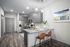 Furnished kitchen with island chairs