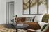 Elegant living room with a luxurious brown leather sofa, chic decor, and modern art on the wall, creating a cozy and stylish atmosphere.