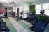 Modern fitness center with state-of-the-art equipment, including treadmills, elliptical machines, and exercise bikes, set in a bright, stylish space.