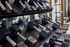 Modern fitness center with neatly arranged dumbbells, ideal for strength training and a healthy lifestyle.