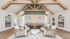 Elegant lobby space featuring modern seating, wooden ceiling beams, and stylish decor at Livano.