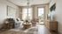 Bright and cozy living room featuring elegant decor, a plush gray sofa, and modern wood accents, with ample natural light from large windows and a stylish ceiling fan.